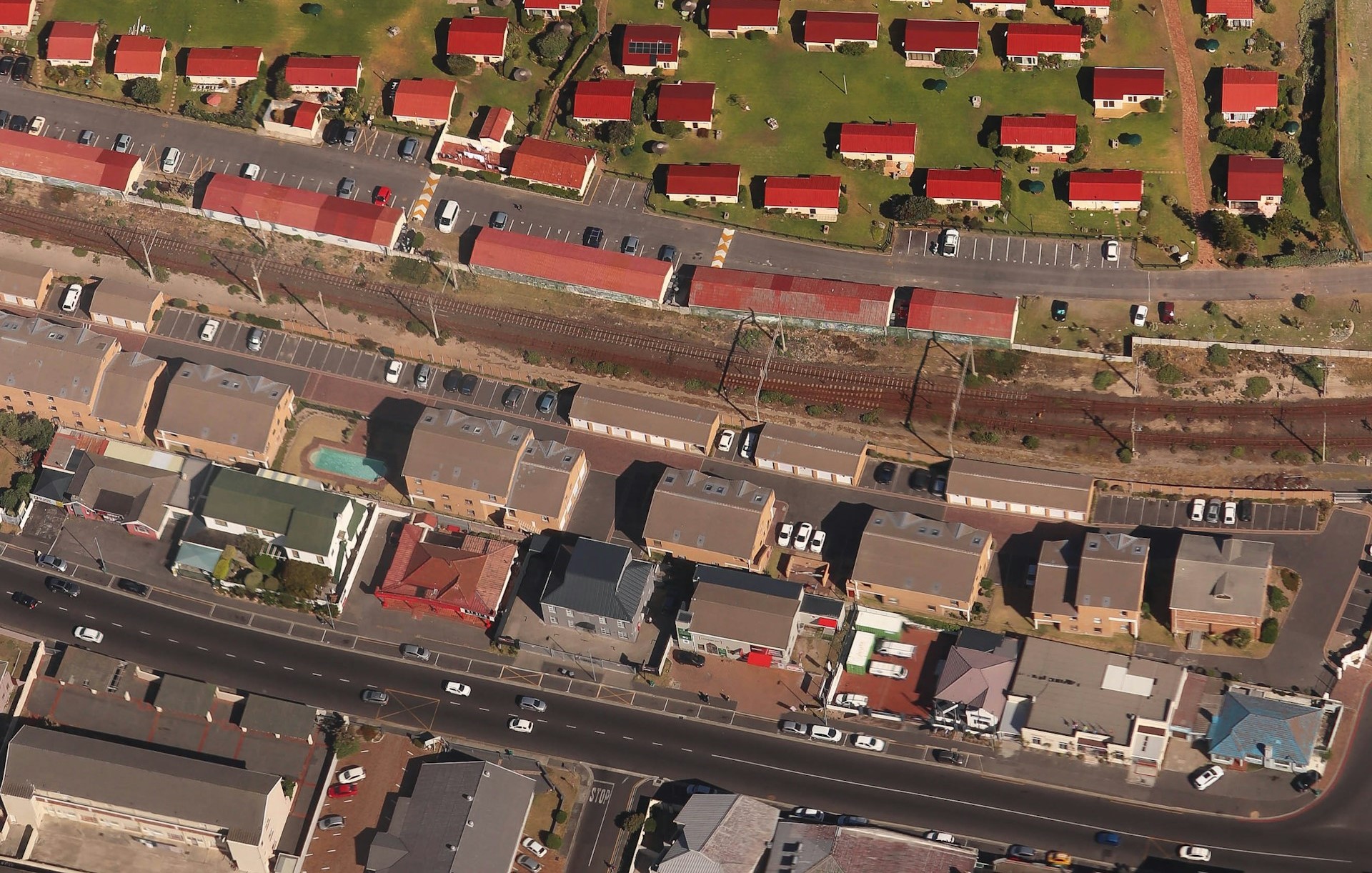 An aerial photograph of a number of properties, including homes and businesses.