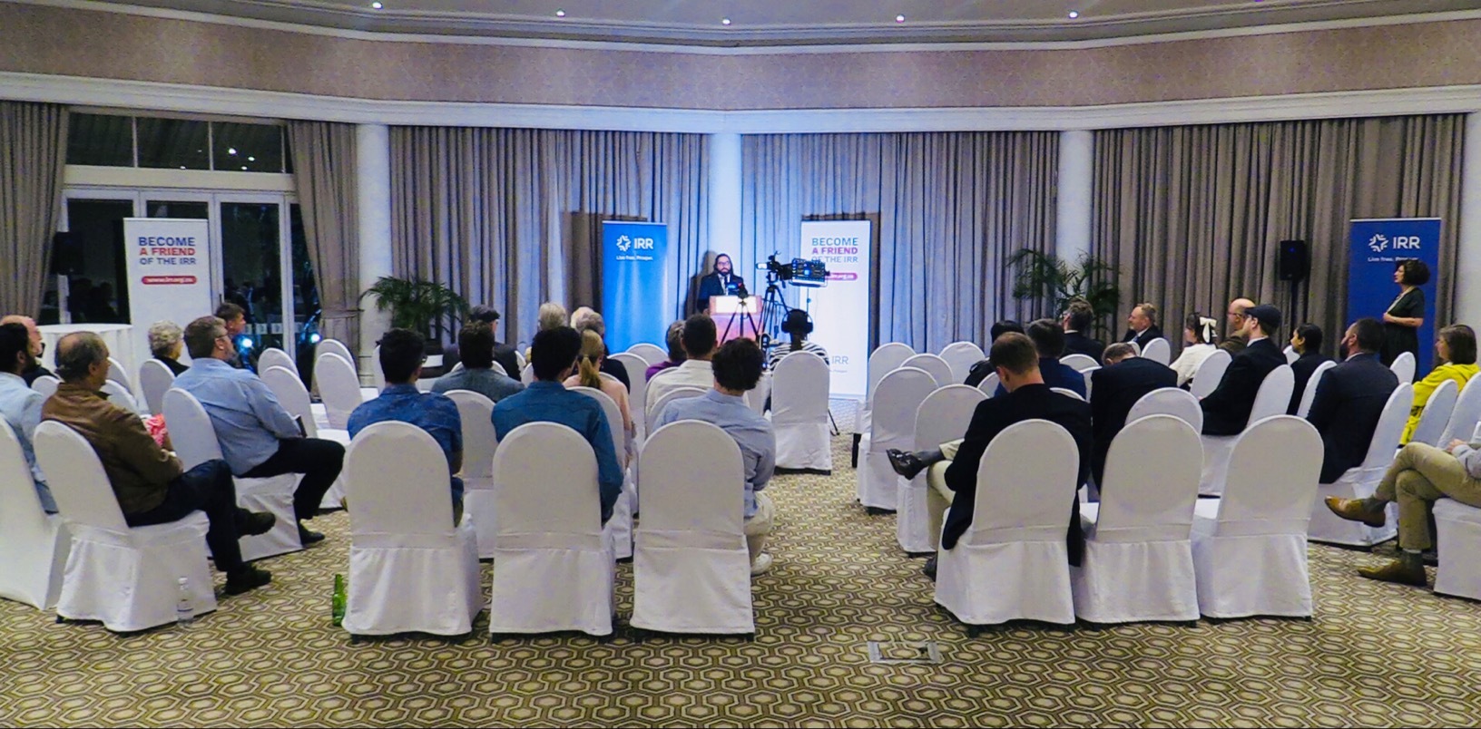 A photograph taken from behind the audience at the Hoernlé Memorial Lecture.